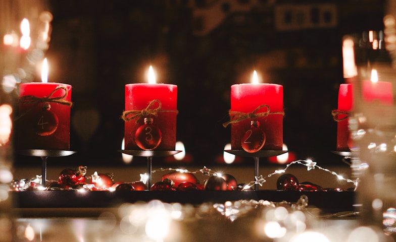 four lighted candles